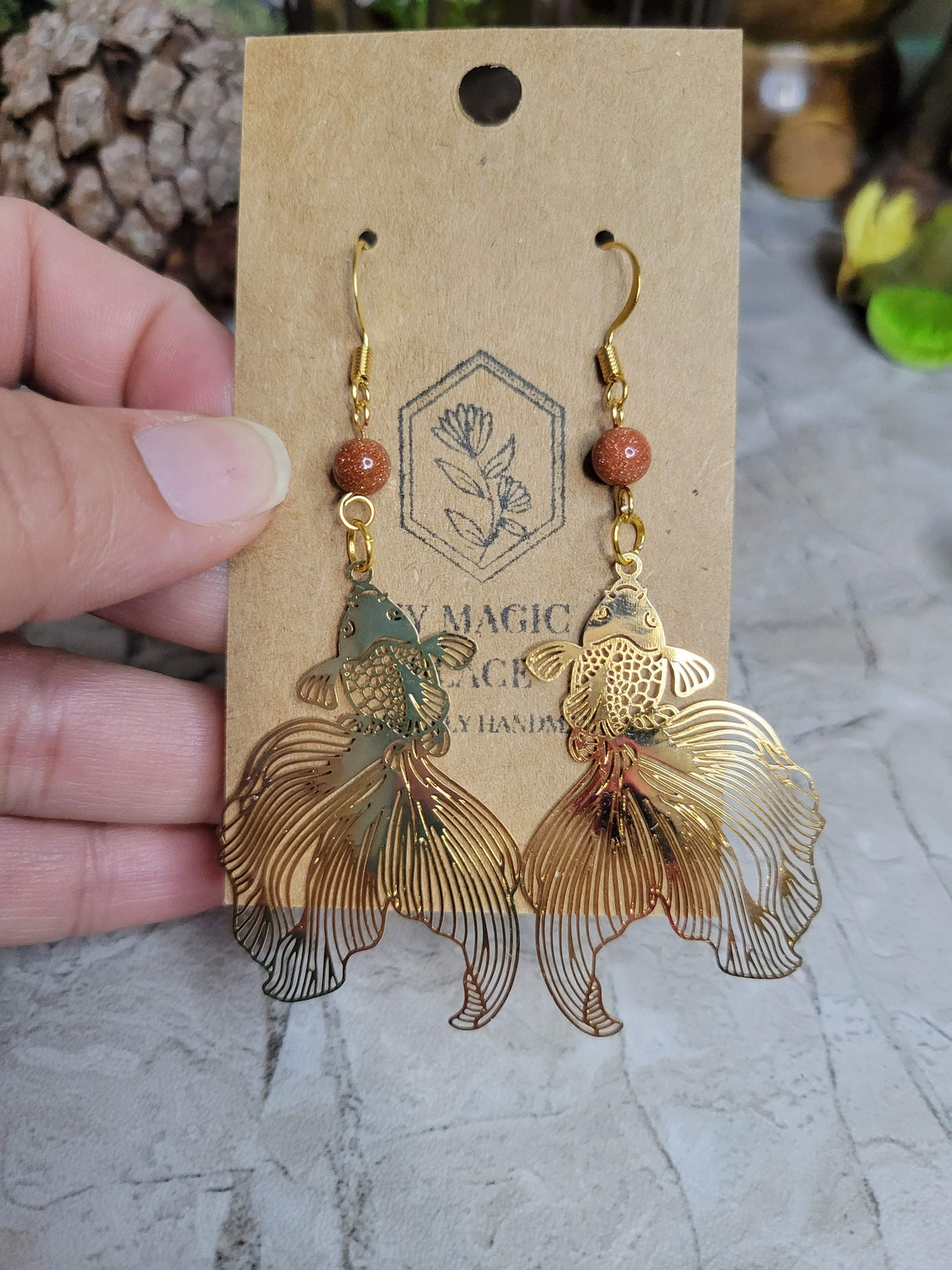 Goldstone and gold fish color earrings / abundance jewelry