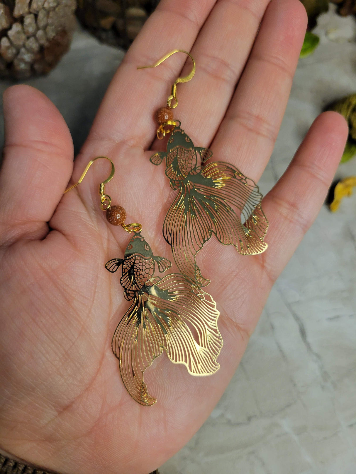 Goldstone and gold fish color earrings / abundance jewelry