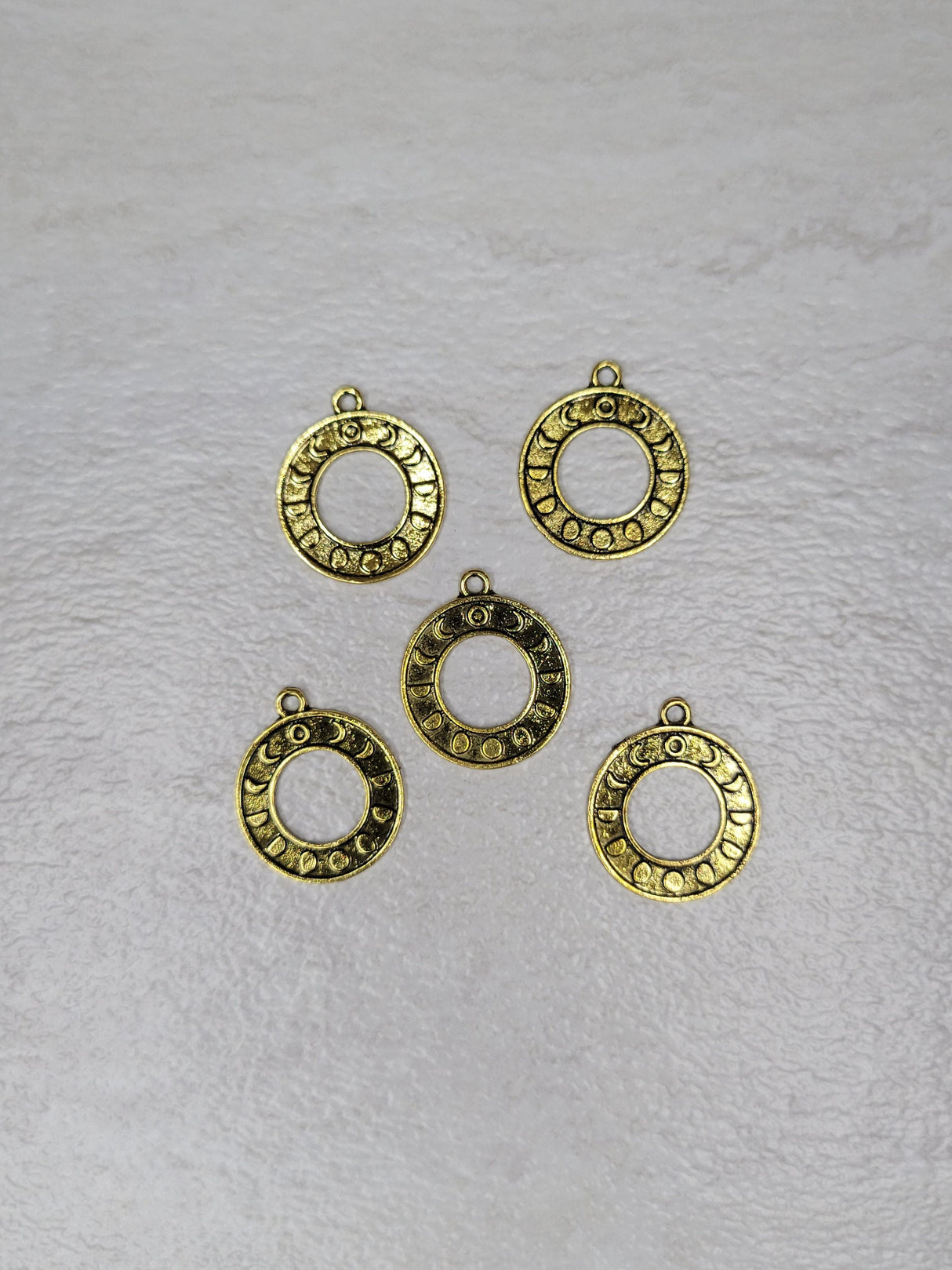 Round moon phase charm antique golden color