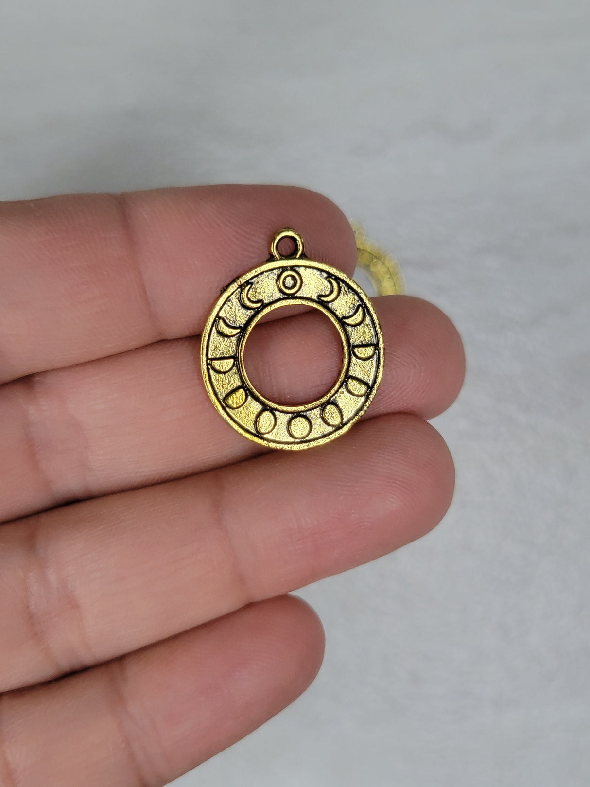 Round moon phase charm antique golden color