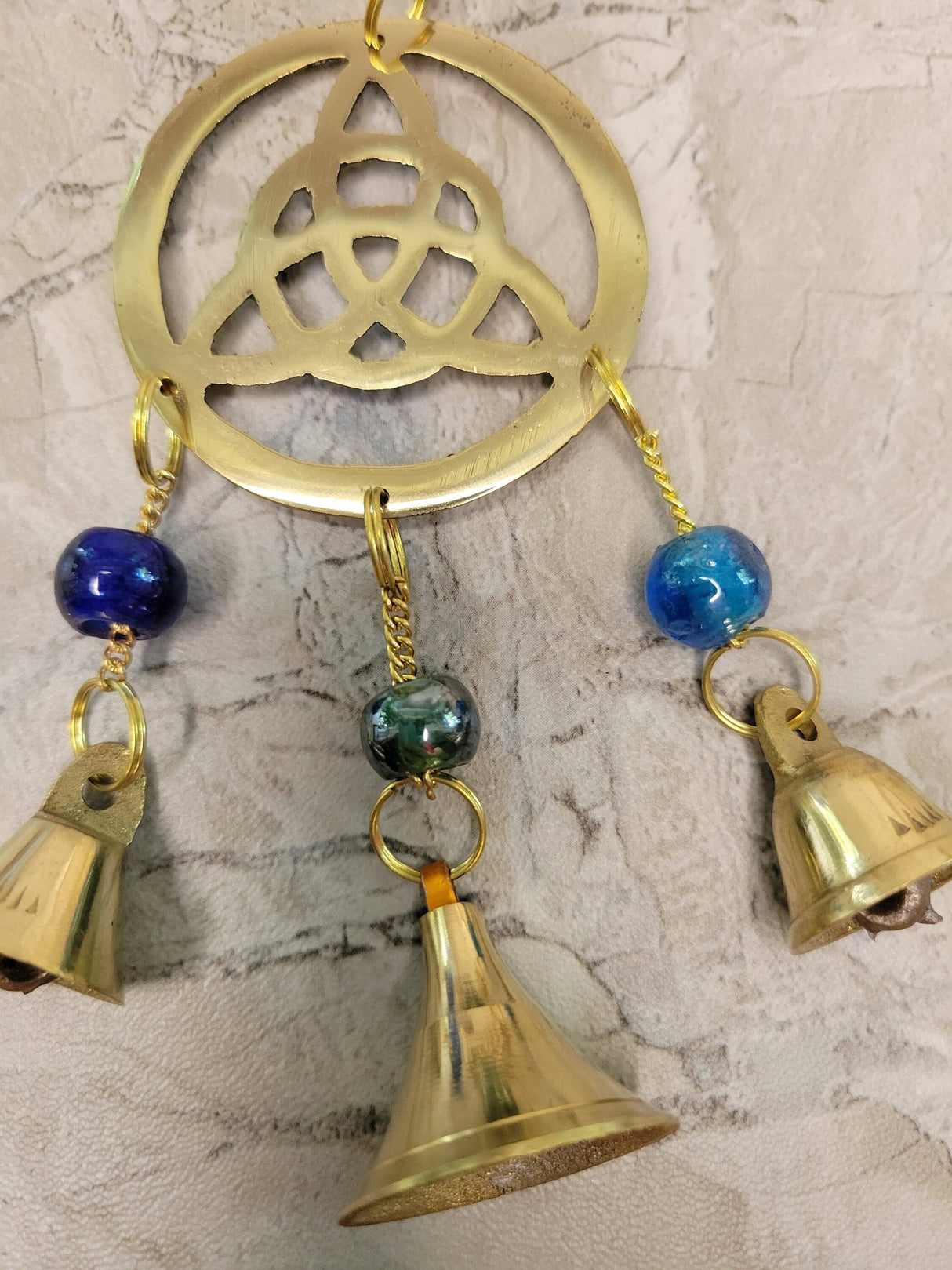 Handmade brass wind chime with bells and beads triquetra witch bells
