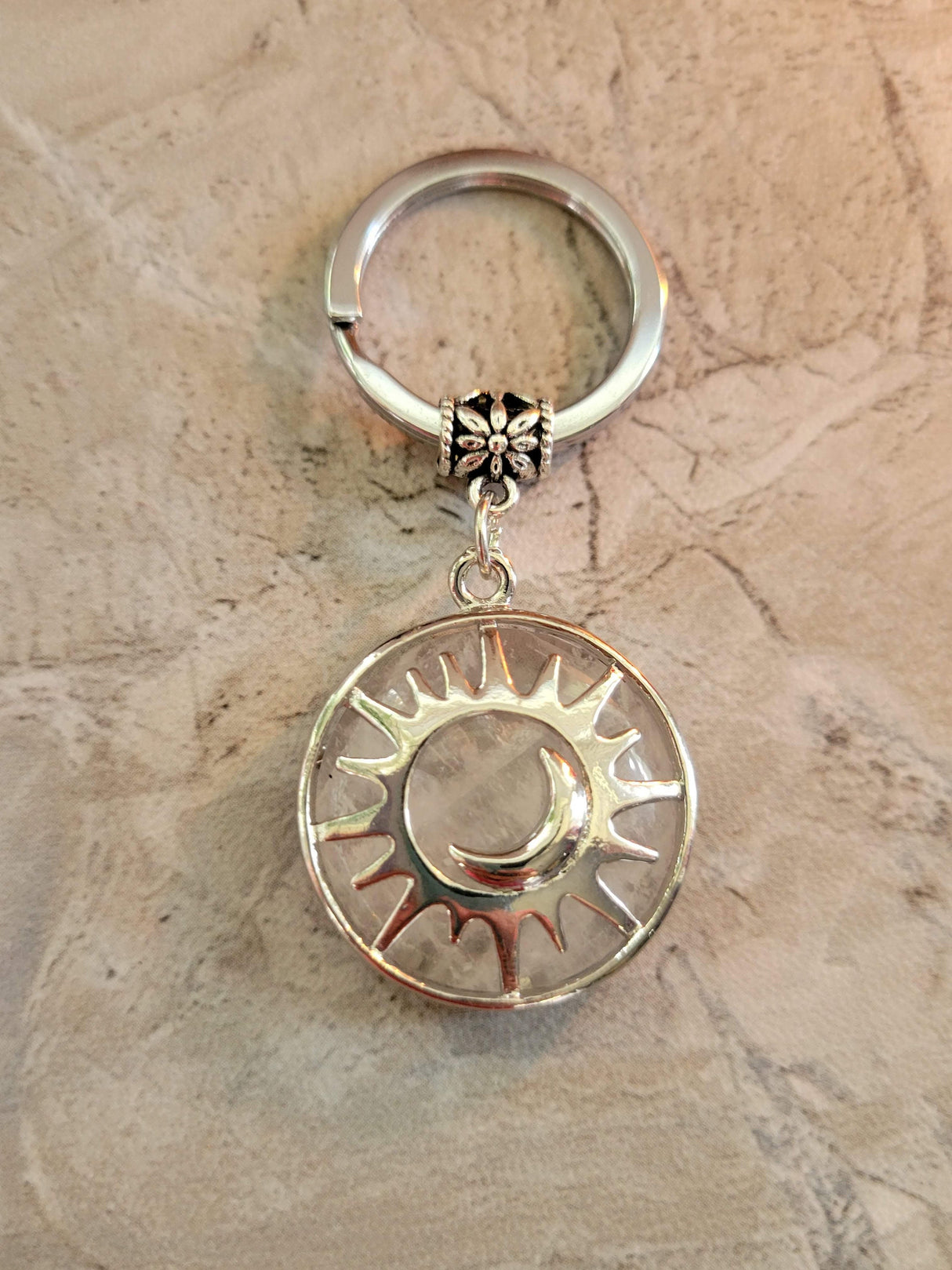 Natural quartz crystal keychain, flat round with sun & moon