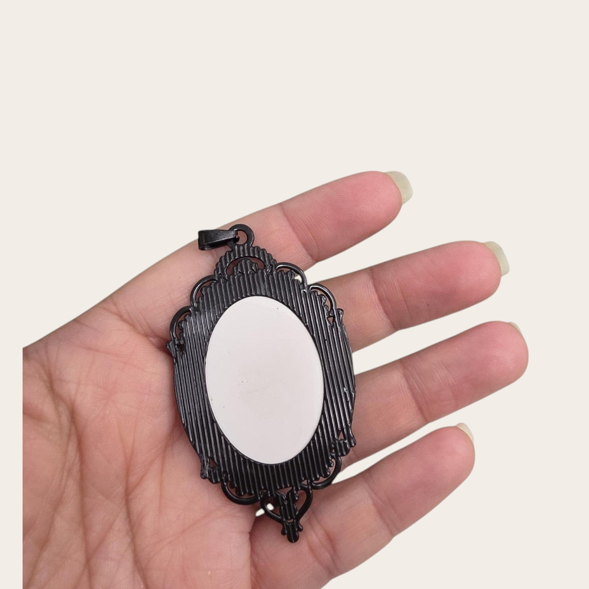 My Magic Place Shop witch hat cameo pendant necklace featuring an ornate vintage-style black filigree metal frame
