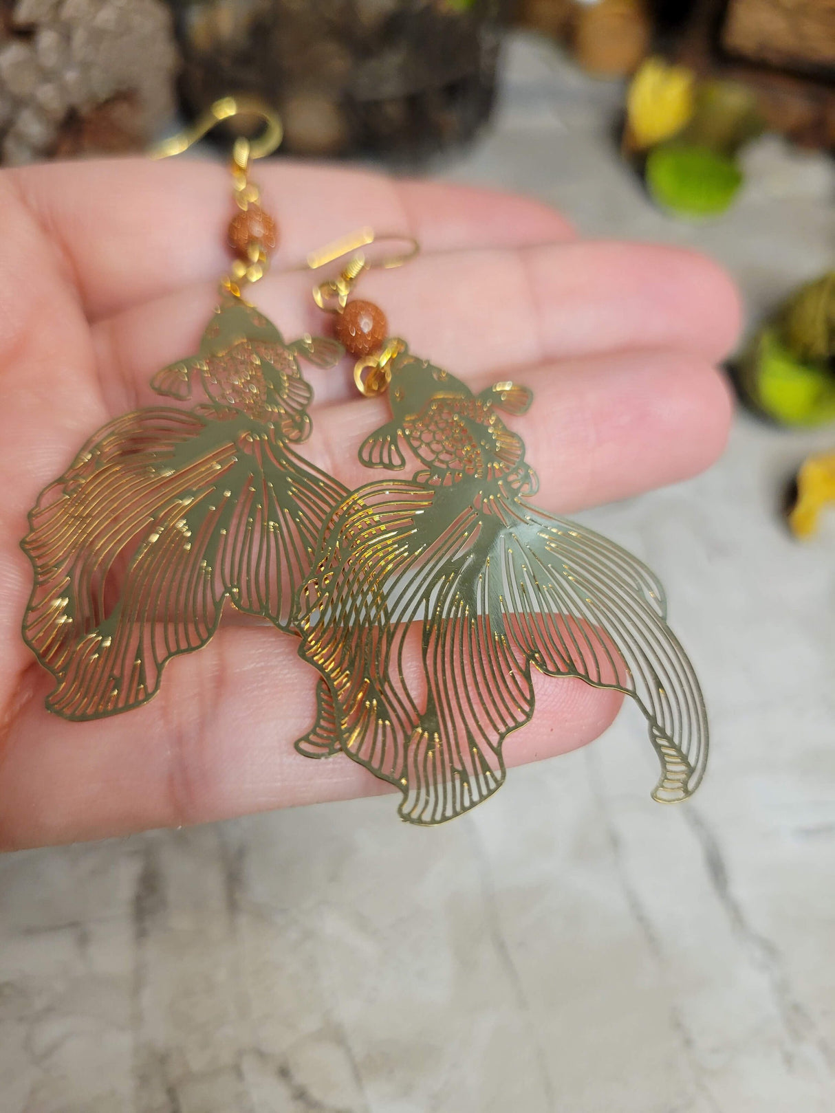 Goldstone and gold fish color earrings / abundance jewelry