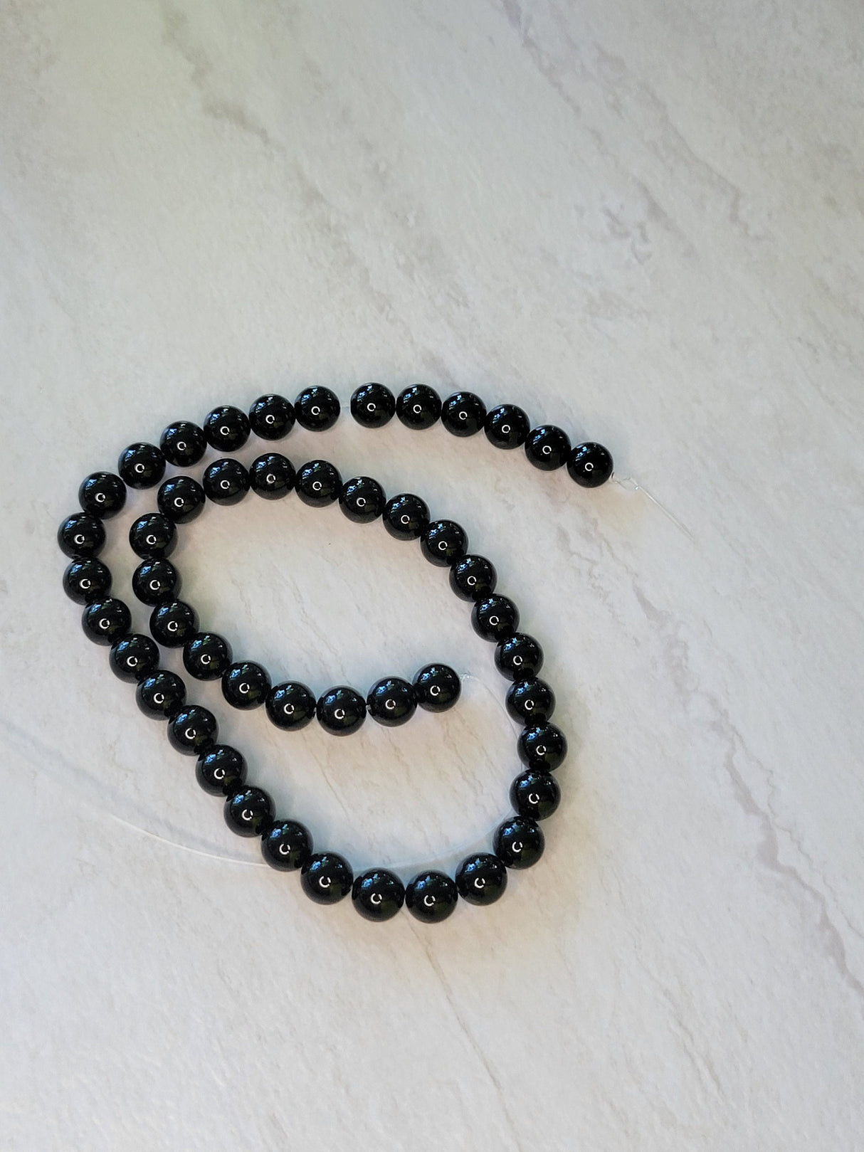 Black onyx Natural round beads Strands