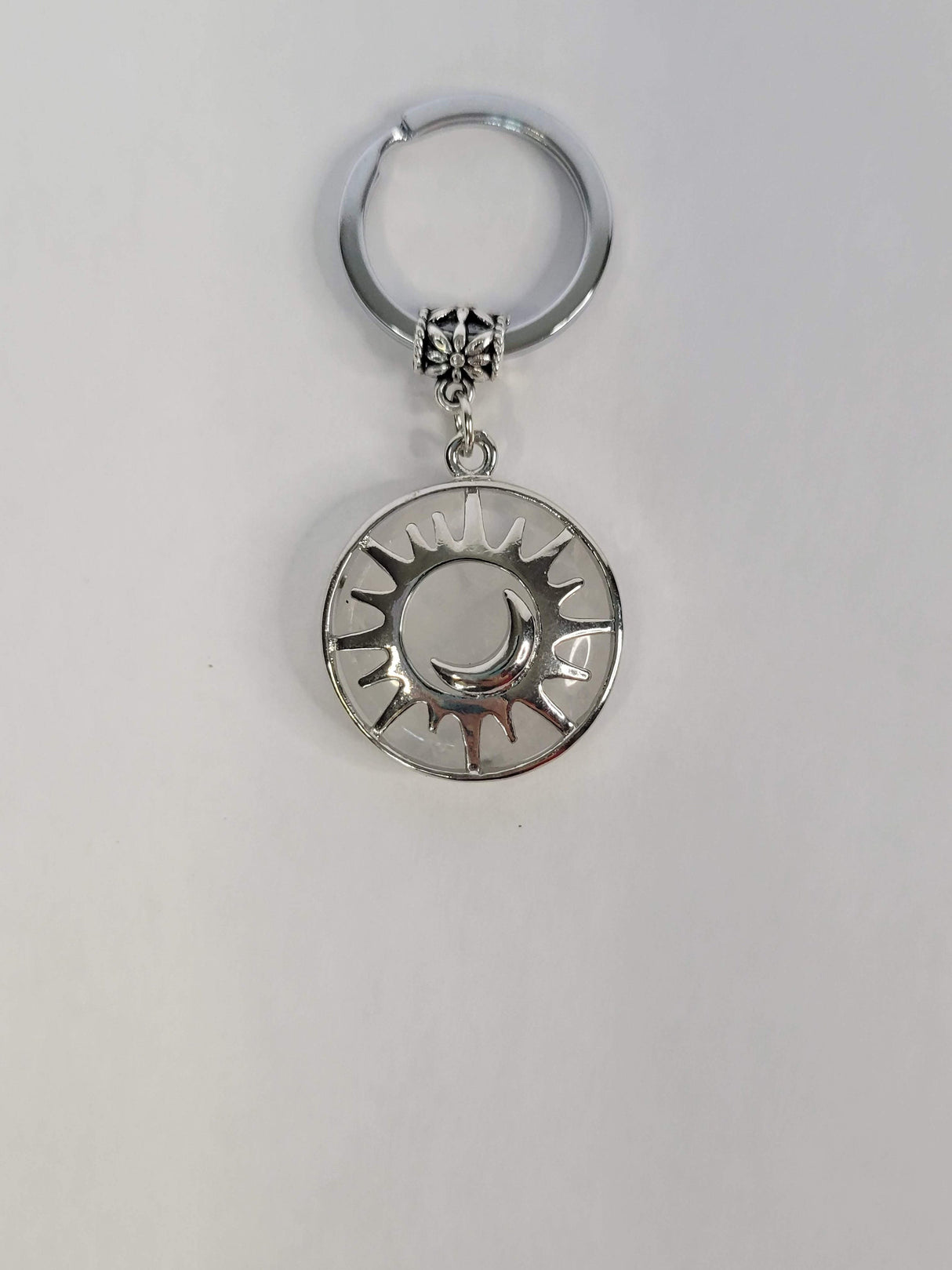 Natural quartz crystal keychain, flat round with sun & moon