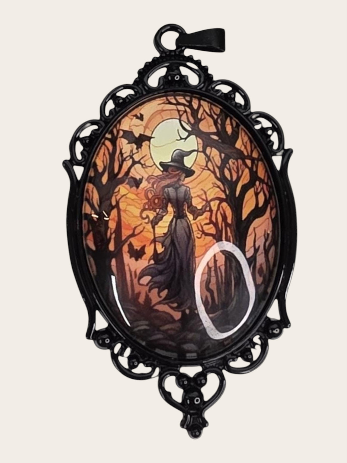 My Magic Place Shop oval witch pendant with moonlit forest illustration in an ornate black gothic metal frame